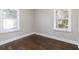 Comfortable bedroom with hardwood floors, and bright windows at 1084 Fairburn Nw Rd, Atlanta, GA 30331