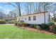 A bright one-story home features a well-maintained lawn and established landscaping at 1084 Fairburn Nw Rd, Atlanta, GA 30331