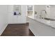 Elegant kitchen featuring granite countertops, white cabinets, and modern fixtures at 1084 Fairburn Nw Rd, Atlanta, GA 30331