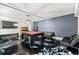 Finished basement with game tables, unique flooring, and plenty of space for entertainment at 160 A Vanira Se Ave, Atlanta, GA 30315