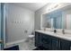 Modern bathroom featuring double sinks, a white and gray color scheme and luxury mirrors at 1831 Galilee Ct, Tucker, GA 30084