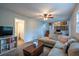 Comfortable living room offering a large sectional sofa, neutral decor, and an open layout at 1831 Galilee Ct, Tucker, GA 30084