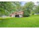 Spacious backyard featuring a well-maintained lawn at 2194 Freydale Se Rd, Marietta, GA 30067