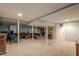 Large finished basement offering ample space for various activities and comfortable seating at 2194 Freydale Se Rd, Marietta, GA 30067