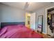 Bedroom with a comfortable bed, closet and hardwood floors, creating a relaxed atmosphere at 2194 Freydale Se Rd, Marietta, GA 30067