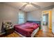 Bedroom featuring a full bed, hardwood floors, and a window for natural light at 2194 Freydale Se Rd, Marietta, GA 30067