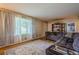 Comfortable living room featuring hardwood floors, area rug, and cozy sofa at 2194 Freydale Se Rd, Marietta, GA 30067