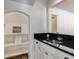 Charming bar area features granite countertops and open shelving at 3559 Turtle Cove Se Ct, Marietta, GA 30067