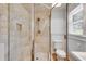 Bathroom featuring a stand-up shower with a glass door and a tile surround at 3559 Turtle Cove Se Ct, Marietta, GA 30067