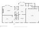 First floor plan featuring a living room, kitchen, dining room, garage, den, bathroom, and laundry room at 3559 Turtle Cove Se Ct, Marietta, GA 30067