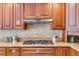 Close up of gourmet kitchen featuring granite countertops and stainless steel range at 3559 Turtle Cove Se Ct, Marietta, GA 30067