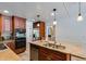 Well-equipped kitchen with stainless steel appliances and abundant counter space at 3559 Turtle Cove Se Ct, Marietta, GA 30067