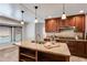 Spacious kitchen island features a breakfast bar and sink, perfect for entertaining at 3559 Turtle Cove Se Ct, Marietta, GA 30067
