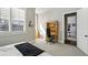 A bedroom with neutral walls, a desk, and shuttered windows at 2020 Bixby Se St, Atlanta, GA 30317