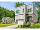 Contemporary home boasts modern design and professional landscaping for great curb appeal at 2020 Bixby Se St, Atlanta, GA 30317