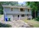 Two-story home with garage and backyard area; ample parking and outdoor space at 1834 Buckeye Sw St, Atlanta, GA 30310