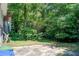 Lush backyard with trees offering a private outdoor space at 1834 Buckeye Sw St, Atlanta, GA 30310
