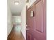 View from front door showing hardwood floors that flow into the living space with window views at 1834 Buckeye Sw St, Atlanta, GA 30310