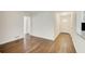 Inviting living room featuring gleaming hardwood floors and a welcoming front door at 1834 Buckeye Sw St, Atlanta, GA 30310