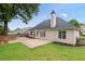 Secluded backyard featuring a spacious patio and lush lawn, perfect for outdoor gatherings at 3549 Daventry Nw Ln, Kennesaw, GA 30144
