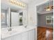 Bathroom features double sinks, a large mirror, and access to the main bedroom at 3549 Daventry Nw Ln, Kennesaw, GA 30144