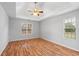 Spacious bedroom with tray ceiling, ceiling fan and natural light at 3549 Daventry Nw Ln, Kennesaw, GA 30144