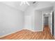 Bedroom with high ceilings, hardwood floors, ceiling fan, and closet at 3549 Daventry Nw Ln, Kennesaw, GA 30144