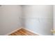 Walk-in closet features shelving and hardwood floors at 3549 Daventry Nw Ln, Kennesaw, GA 30144
