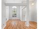 Bright dining room featuring high ceilings, hardwood floors, and large windows at 3549 Daventry Nw Ln, Kennesaw, GA 30144