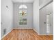 Bright dining room featuring high ceilings, hardwood floors, and large windows at 3549 Daventry Nw Ln, Kennesaw, GA 30144