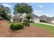 Charming single-Gathering home featuring a brick and siding exterior, well-manicured lawn, and two-car garage in a desirable neighborhood at 3549 Daventry Nw Ln, Kennesaw, GA 30144
