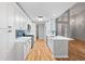 Modern kitchen features quartz countertops, stainless steel appliances, hardwood floors, and open concept design at 3549 Daventry Nw Ln, Kennesaw, GA 30144
