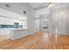 Bright living room with hardwood floors, and open floor plan that flows into a modern kitchen at 3549 Daventry Nw Ln, Kennesaw, GA 30144