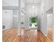 Welcoming living room featuring high ceilings, hardwood floors, and natural light at 3549 Daventry Nw Ln, Kennesaw, GA 30144