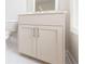 Elegant bathroom vanity with sleek hardware and ample storage space in a modern design at 606 Goldsmith Ct # 114, Johns Creek, GA 30022