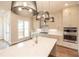 Bright kitchen with quartz counters, modern appliances, pendant lighting, and hardwood floors at 606 Goldsmith Ct # 114, Johns Creek, GA 30022