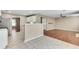 Open kitchen with stainless steel appliances connecting to the living area at 7550 Springmill Ct, Cumming, GA 30028