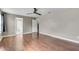 Spacious main bedroom with hardwood floors and connecting bathroom at 7550 Springmill Ct, Cumming, GA 30028