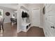 Inviting foyer featuring a convenient coat rack with seating and stylish interior door at 197 Stafford Ln, Villa Rica, GA 30180