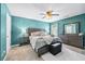 Inviting bedroom showcasing a ceiling fan and complementary furnishings at 1146 Simonton Peak Way, Lawrenceville, GA 30045