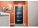 Stylish entryway features a modern front door with glass panels and a modern wall color at 1146 Simonton Peak Way, Lawrenceville, GA 30045