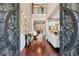 Grand foyer showcasing hardwood floors, an open floor plan, and elegant details throughout, offering a luxurious welcome at 1146 Simonton Peak Way, Lawrenceville, GA 30045