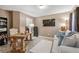 This home office features a desk, shelving, and a comfortable sitting area at 1146 Simonton Peak Way, Lawrenceville, GA 30045