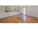 Dining room showcases hardwood floors, decorative wallpaper, and elegant lighting fixture at 1725 Mountainside Dr, Cumming, GA 30040