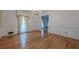 The formal dining room features hardwood floors, traditional details, and a large window at 1725 Mountainside Dr, Cumming, GA 30040
