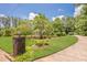 A charming home with well-maintained landscaping and a long, curved driveway at 1725 Mountainside Dr, Cumming, GA 30040
