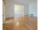 Bright living room showcases gleaming hardwood floors, large windows and an open design at 1725 Mountainside Dr, Cumming, GA 30040