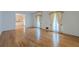 This is an inviting living space featuring gleaming hardwood floors and an open floor plan at 1725 Mountainside Dr, Cumming, GA 30040