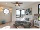 Bright bedroom with large windows and a decorative round window, offering lots of natural light at 3960 Clairmont Rd # 2, Chamblee, GA 30341