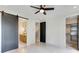 Bedroom with sliding barn door entrance to bathroom and walk-in closet at 3960 Clairmont Rd # 2, Chamblee, GA 30341